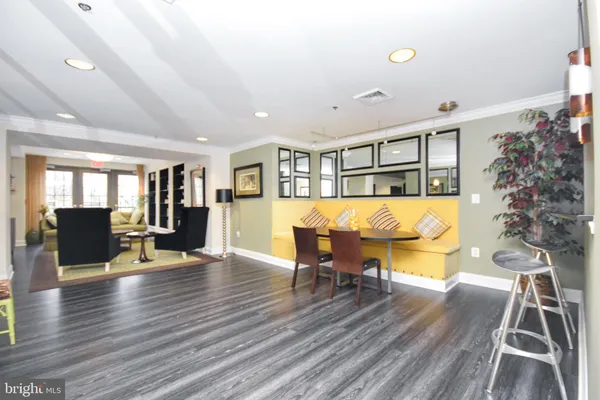 a view of a living room and entry way