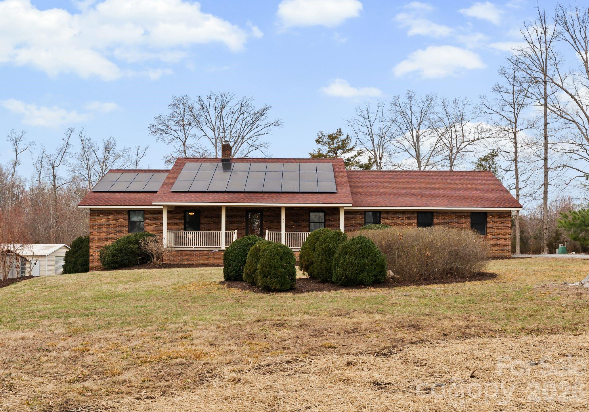 150 Barber Lyerly Road Salisbury, NC 28147 - Photo 4 of 43 a front view of a house with a garden