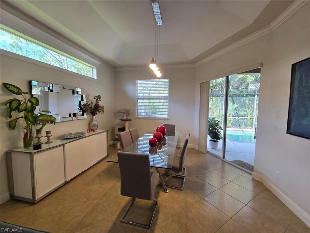 15437 Cortona Way Naples, FL 34120 - Photo 13 of 29 a living room with furniture and a potted plant