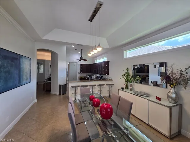 a kitchen with a sink cabinets and window