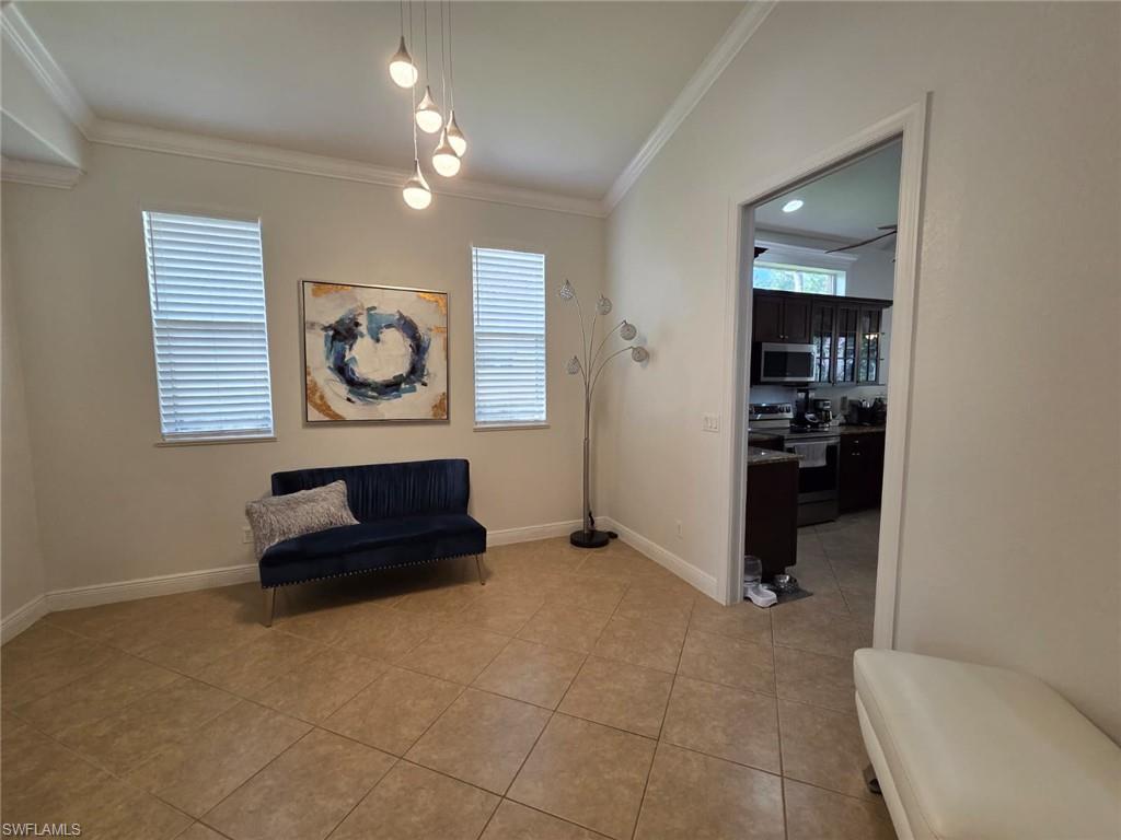 15437 Cortona Way Naples, FL 34120 - Photo 17 of 29 a living room with furniture and a air conditioner vent