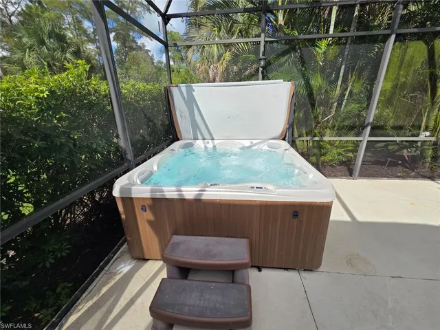 a view of a back yard from a balcony