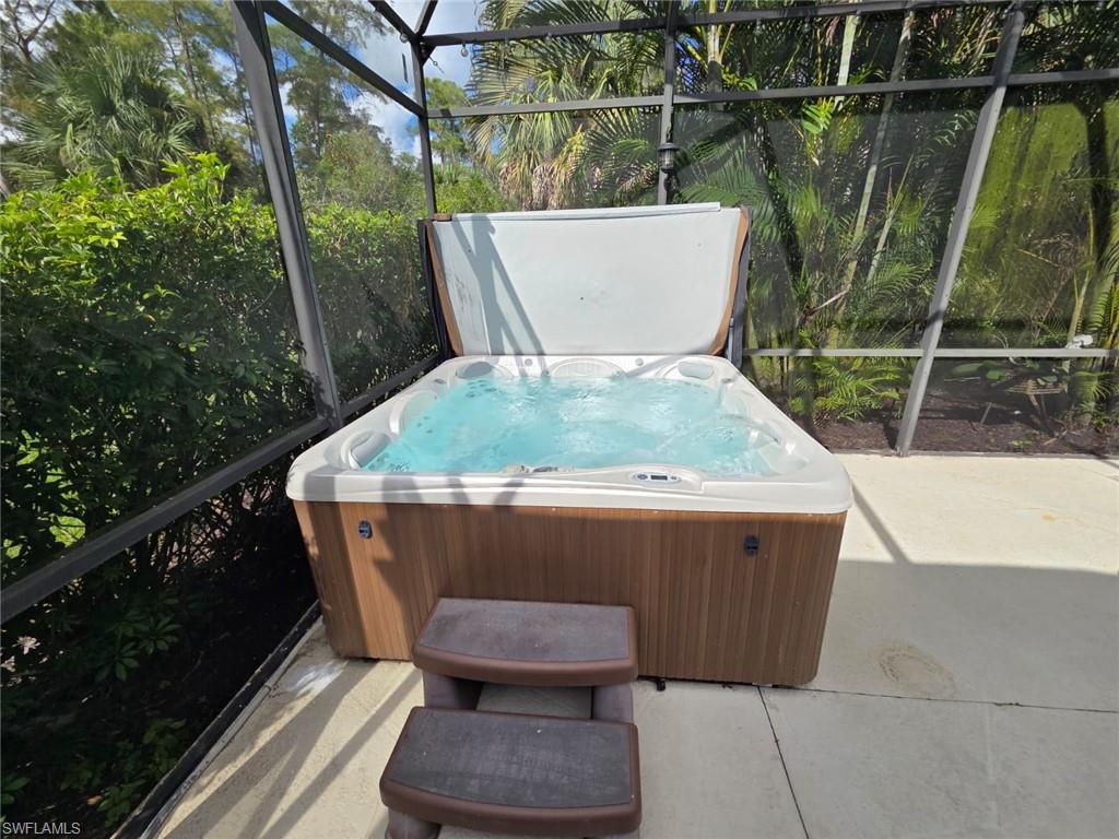 15437 Cortona Way Naples, FL 34120 - Photo 5 of 29 a view of a back yard from a balcony