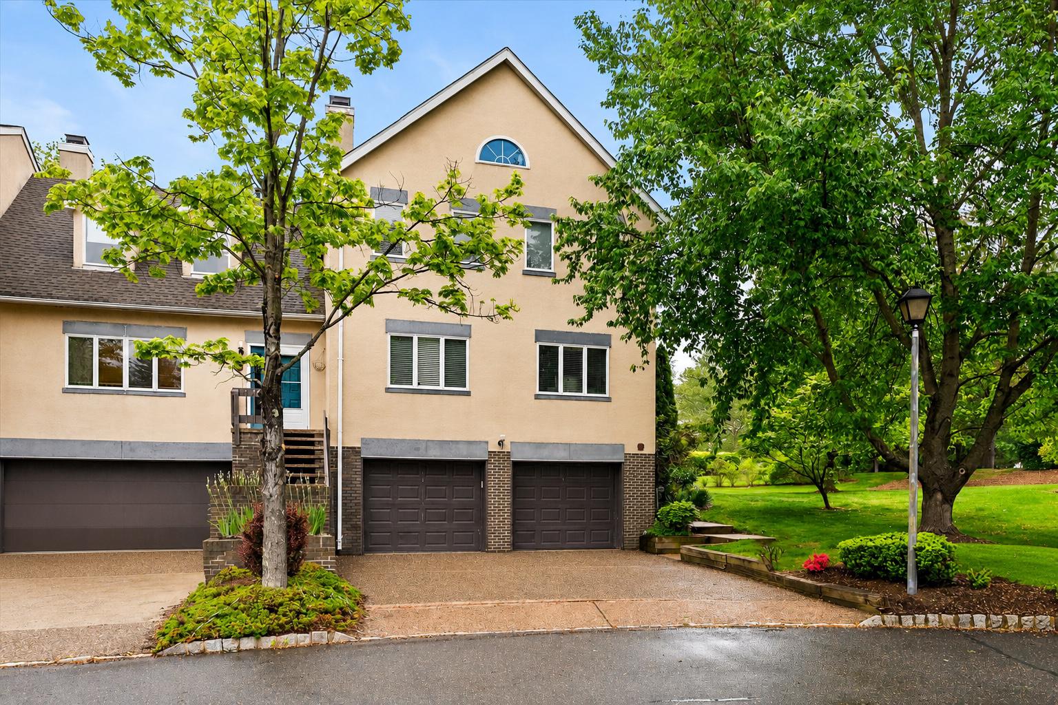 Front view, 2-car garage
