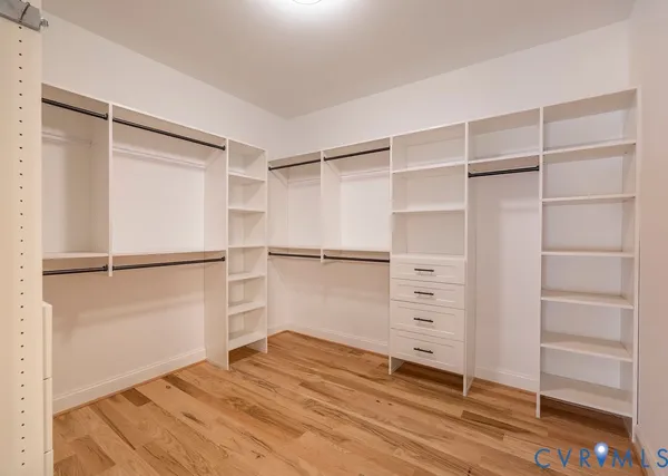 a view of an empty walk in closet