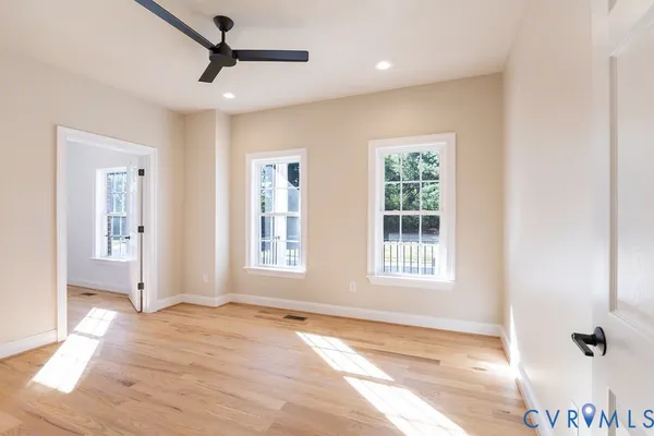 a view of an empty room with a window