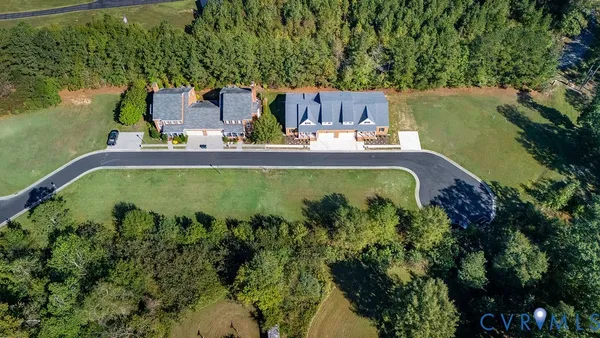 a view of a swimming pool with a yard