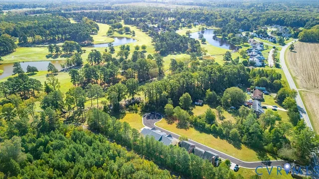 a view of a lake with a building in the background