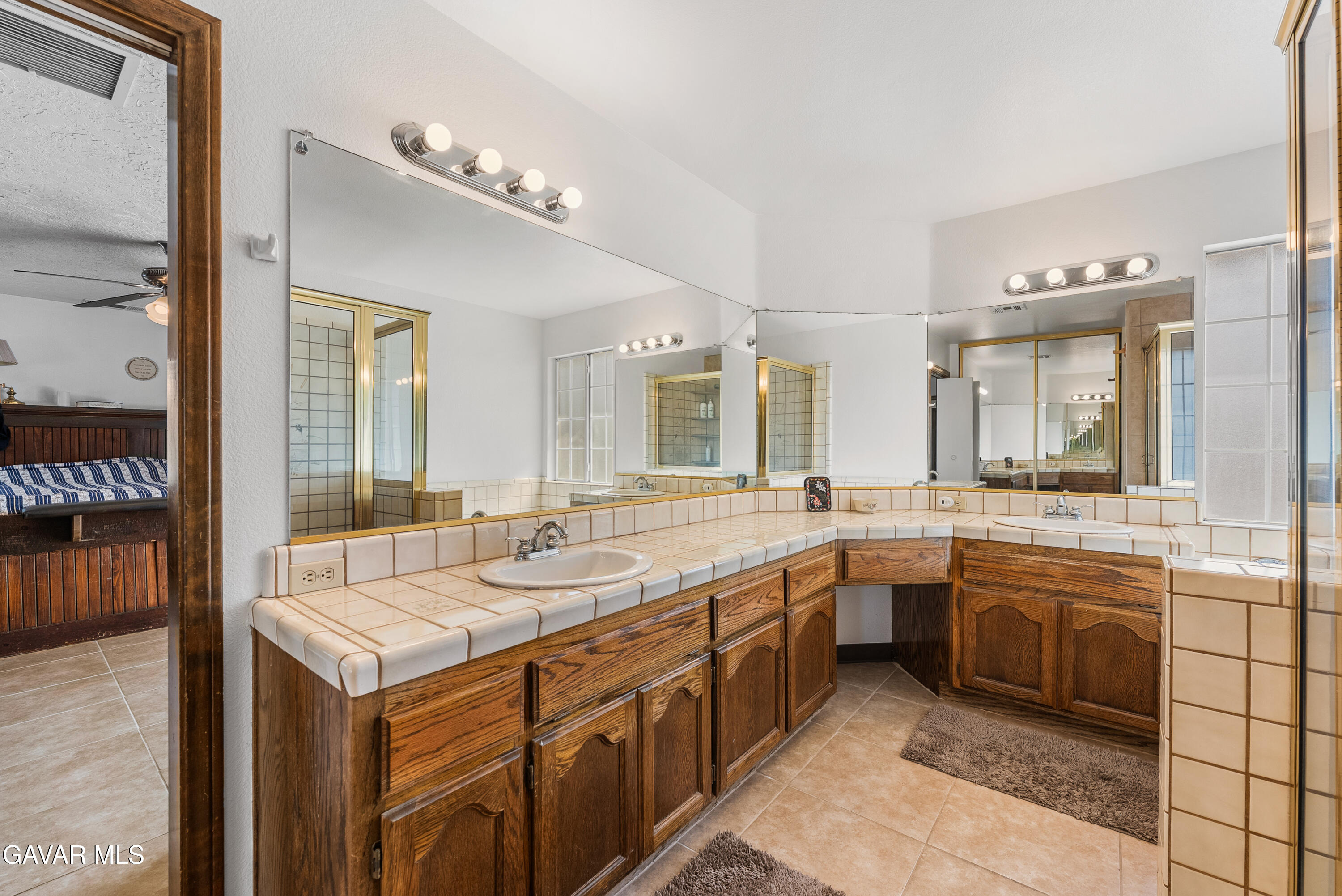 40508 154th Street East Lancaster, CA 93535 - Photo 15 of 20 a large white kitchen with a sink and cabinets