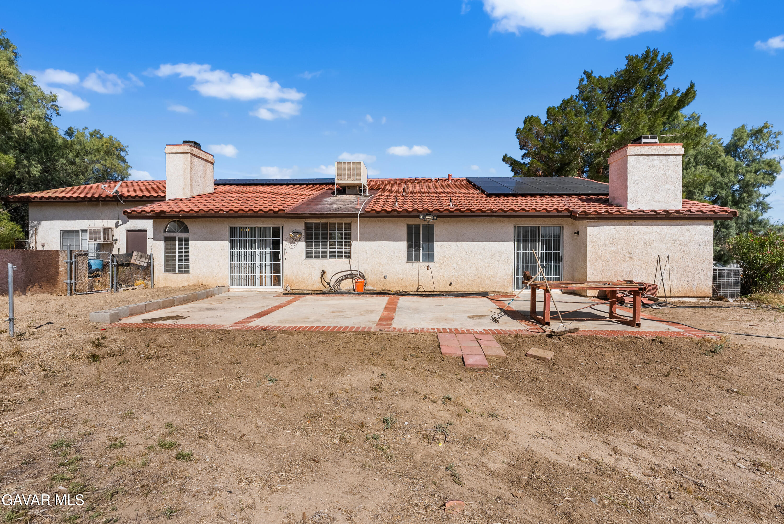 40508 154th Street East Lancaster, CA 93535 - Photo 18 of 20 a view of a white house with a patio