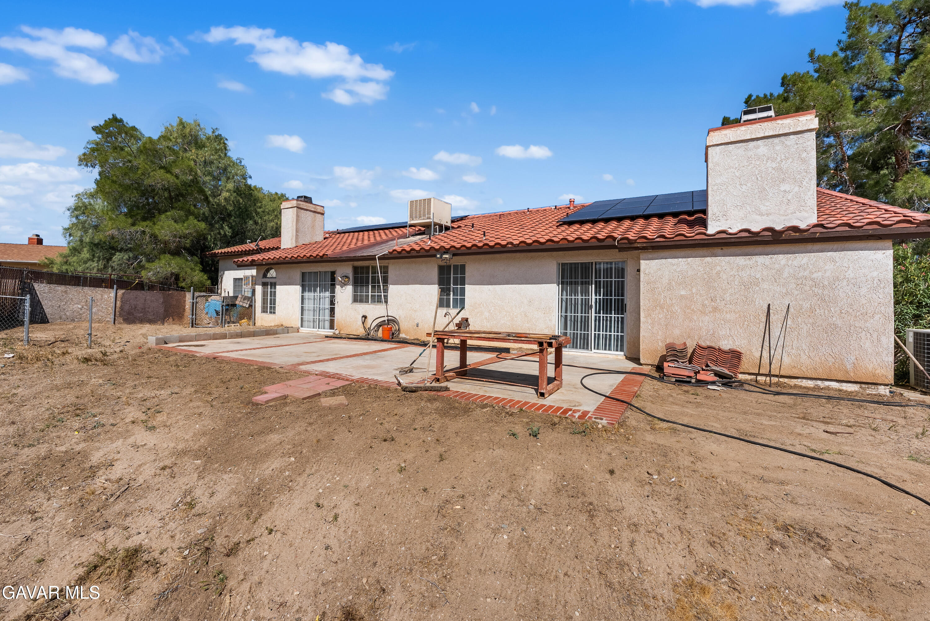 40508 154th Street East Lancaster, CA 93535 - Photo 19 of 20 a view of a house with backyard and sitting area