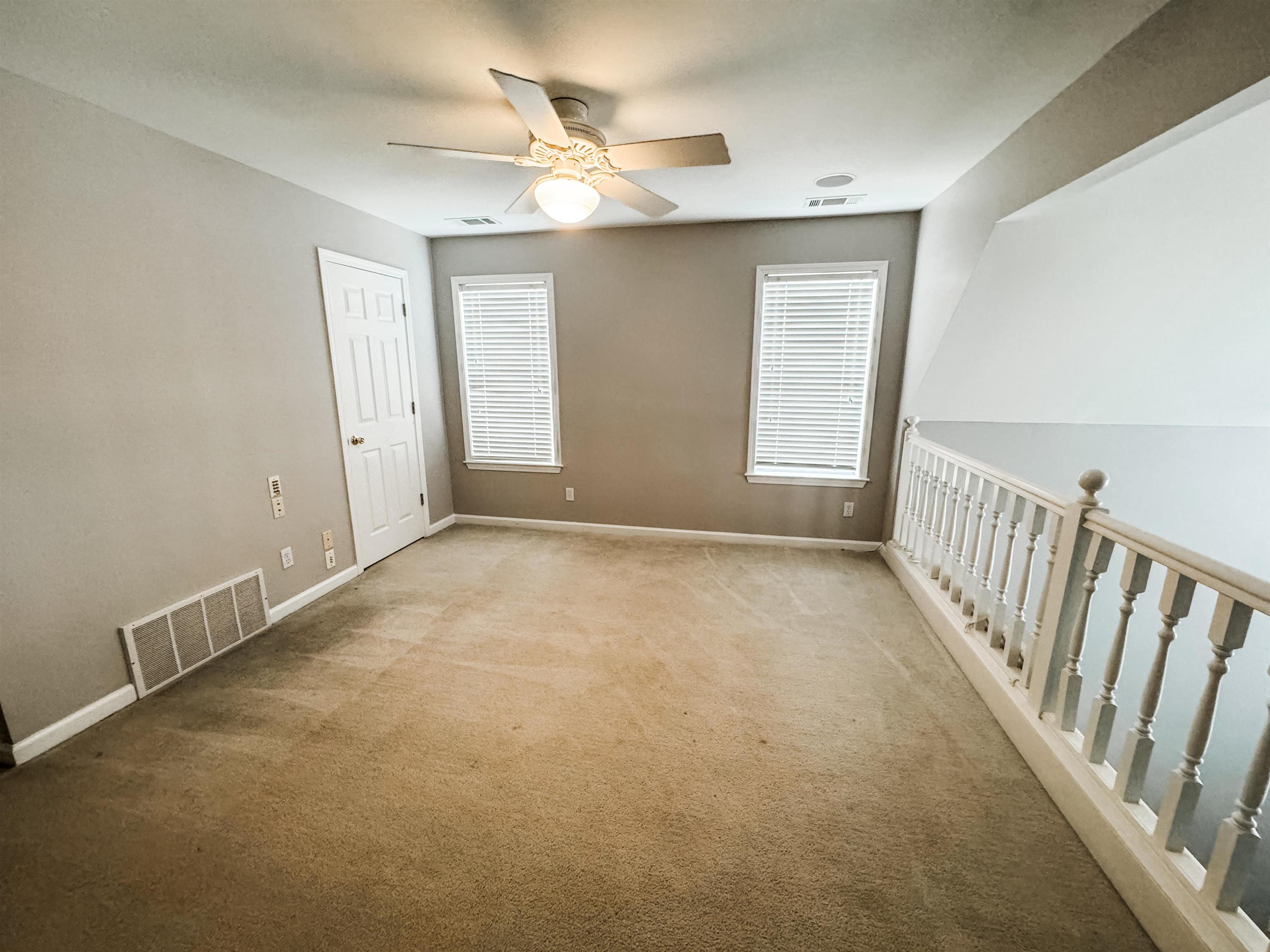 4564 Park Ridge Parkway Collierville, TN 38017 - Photo 7 of 12 a view of an empty room with a window