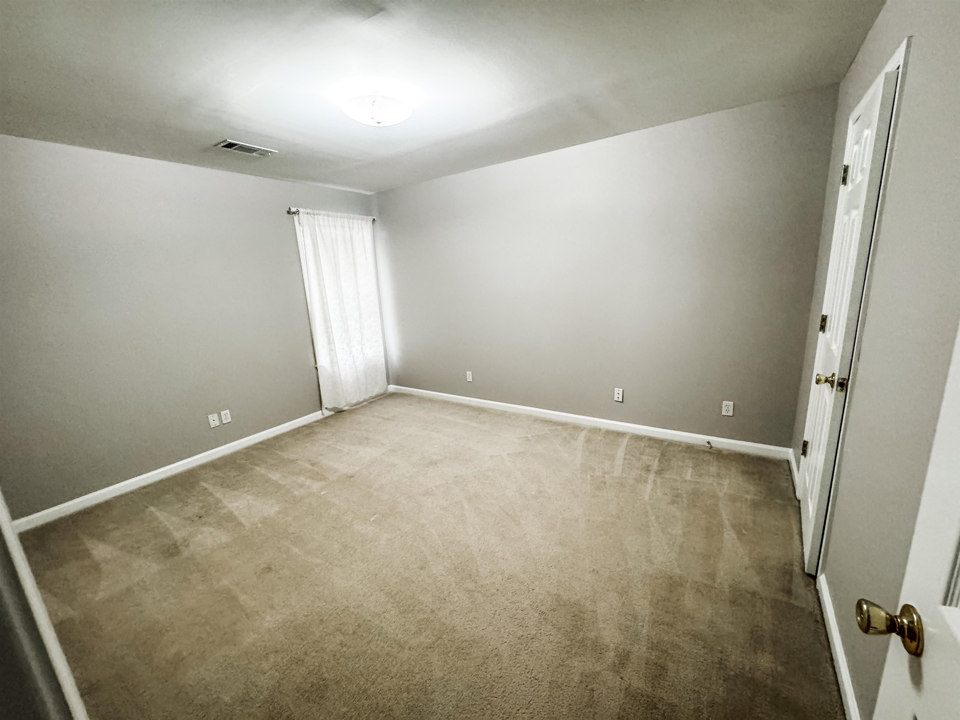 4564 Park Ridge Parkway Collierville, TN 38017 - Photo 10 of 12 an empty room with windows