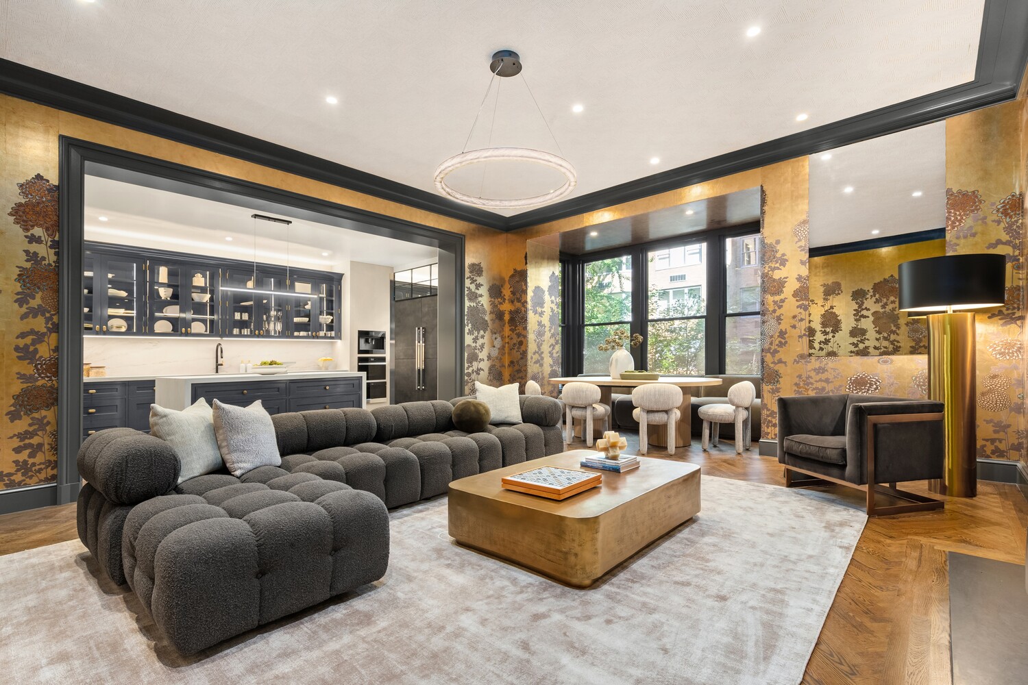 125 East 65th Street Manhattan, NY 10065 - Photo 10 of 26 a living room with furniture and a large window