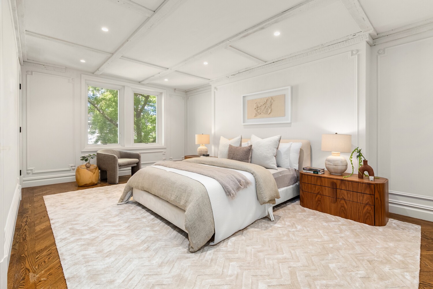 125 East 65th Street Manhattan, NY 10065 - Photo 17 of 26 a bedroom with bed and window