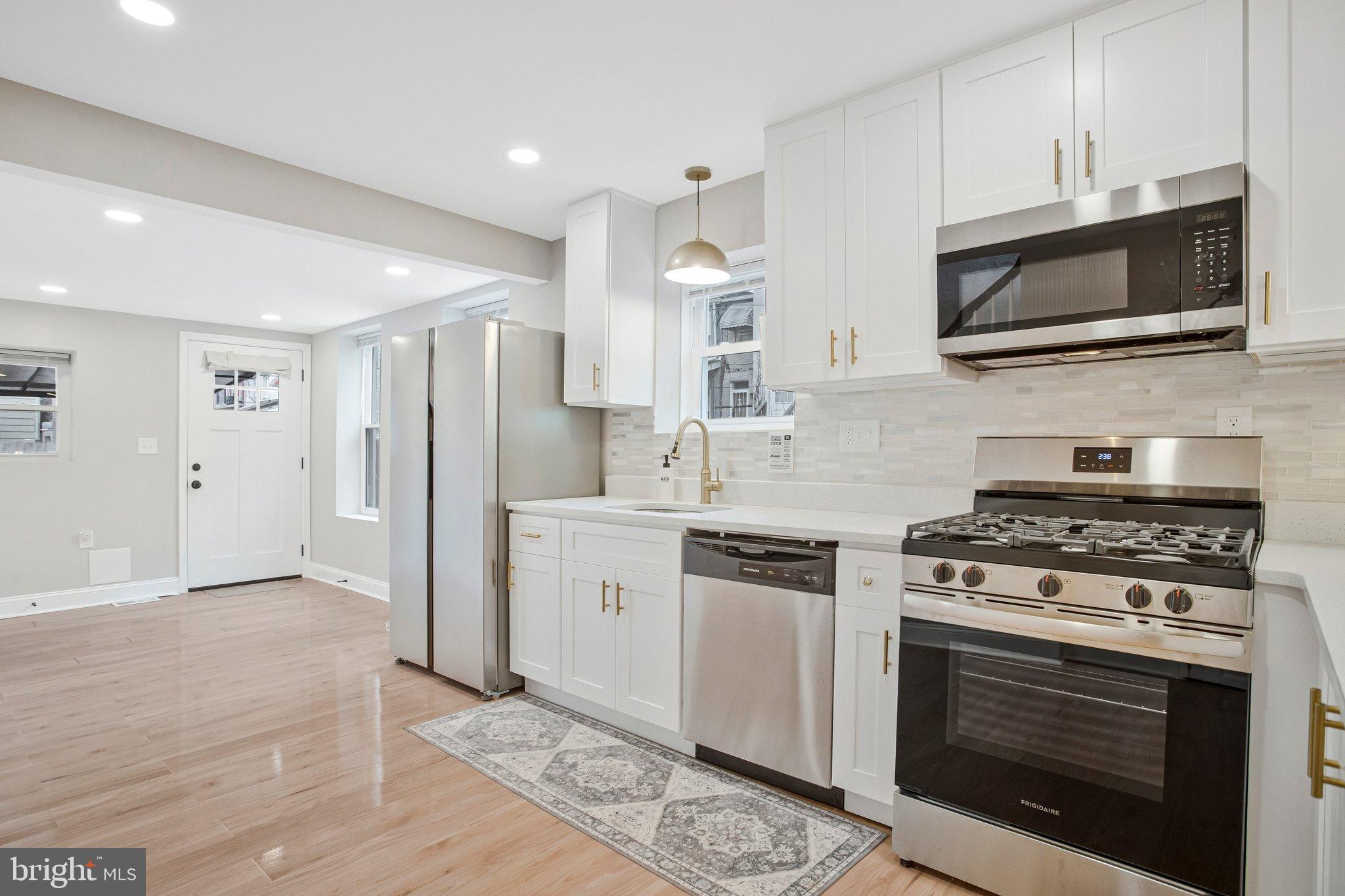 1102 Carroll Street Baltimore, MD 21230 - Photo 14 of 52 Modern kitchen with sleek finishes.