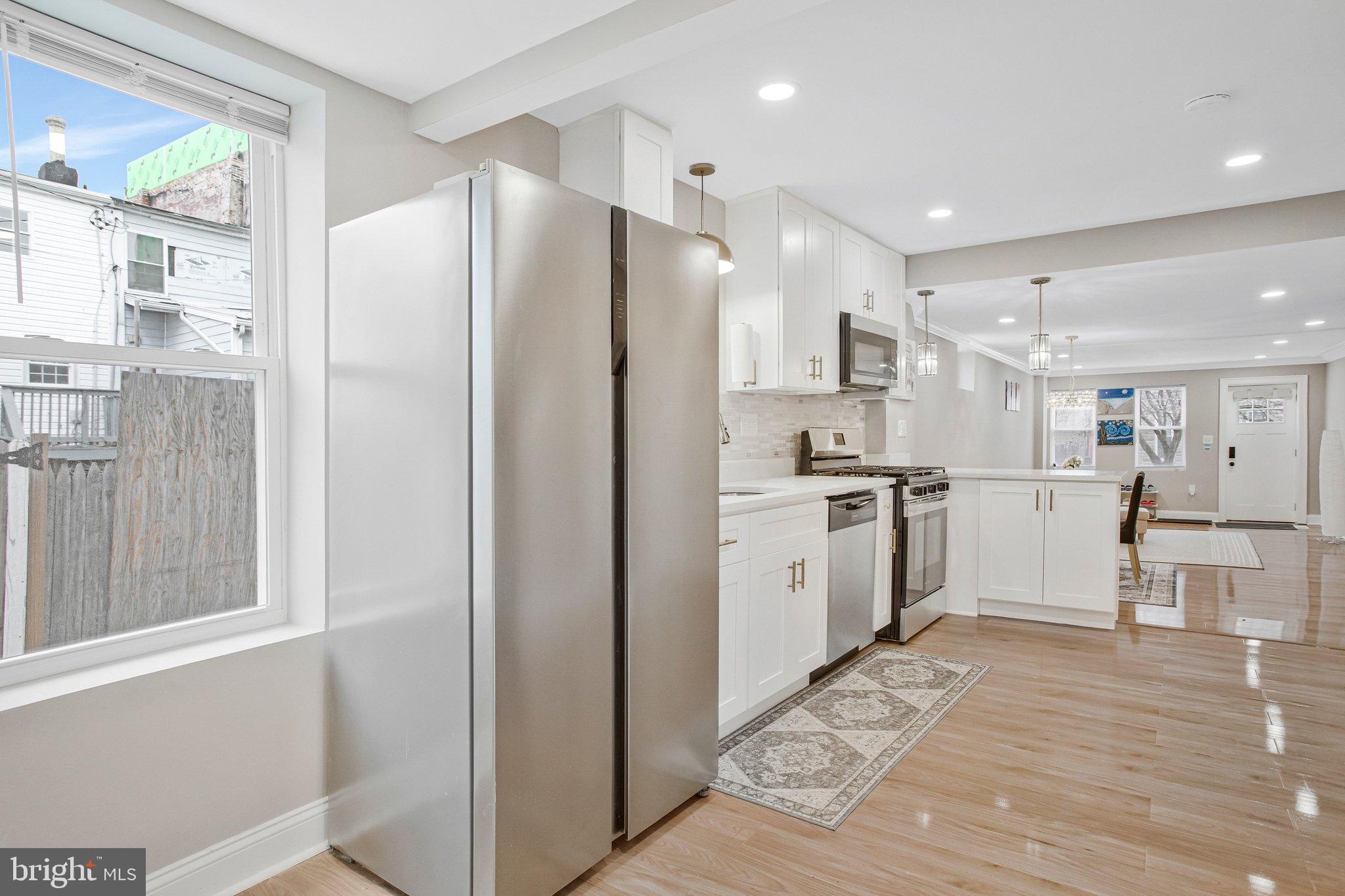 1102 Carroll Street Baltimore, MD 21230 - Photo 16 of 52 Modern kitchen with sleek appliances.