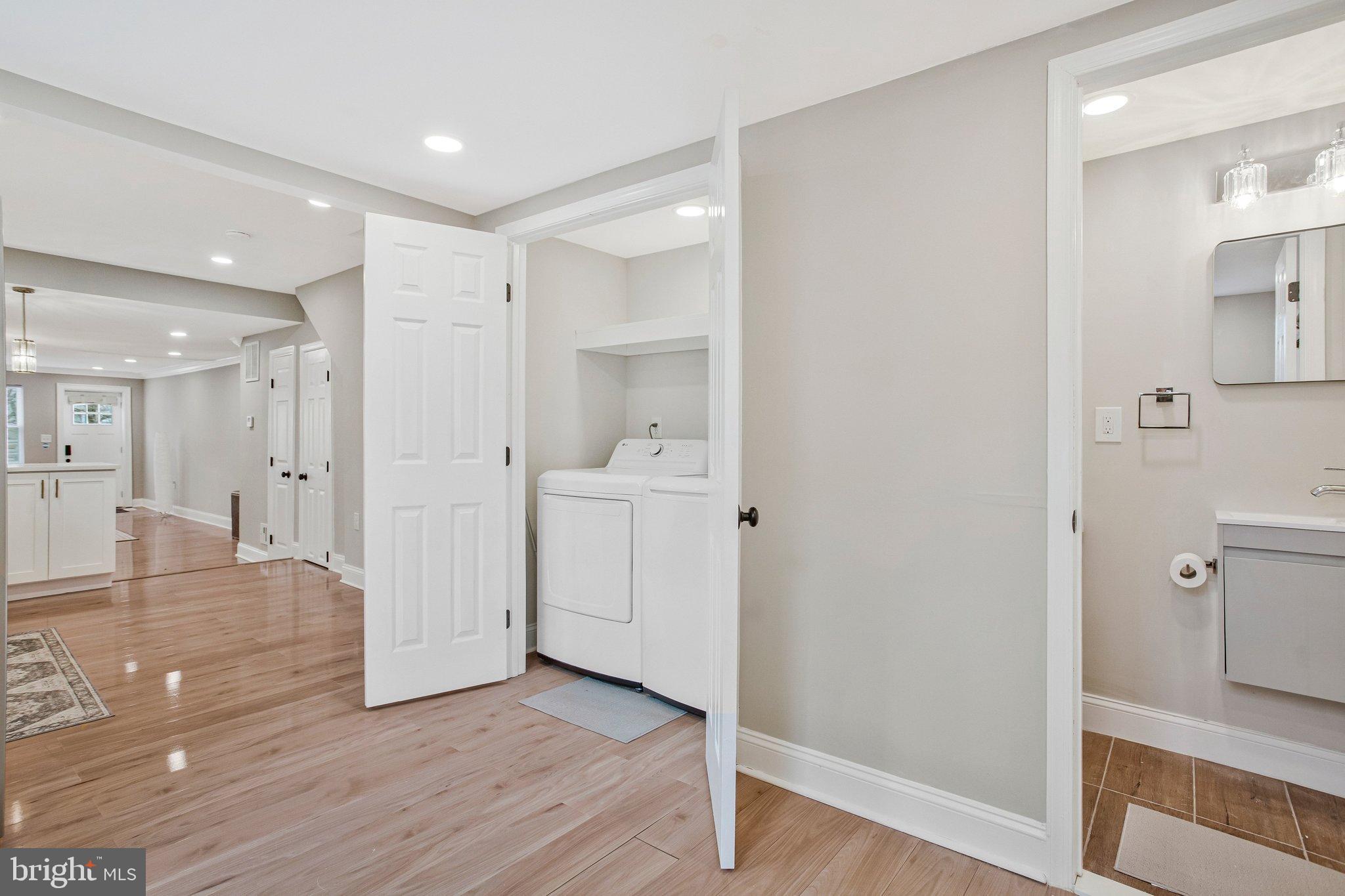 1102 Carroll Street Baltimore, MD 21230 - Photo 18 of 52 Bright and airy laundry nook in modern home.