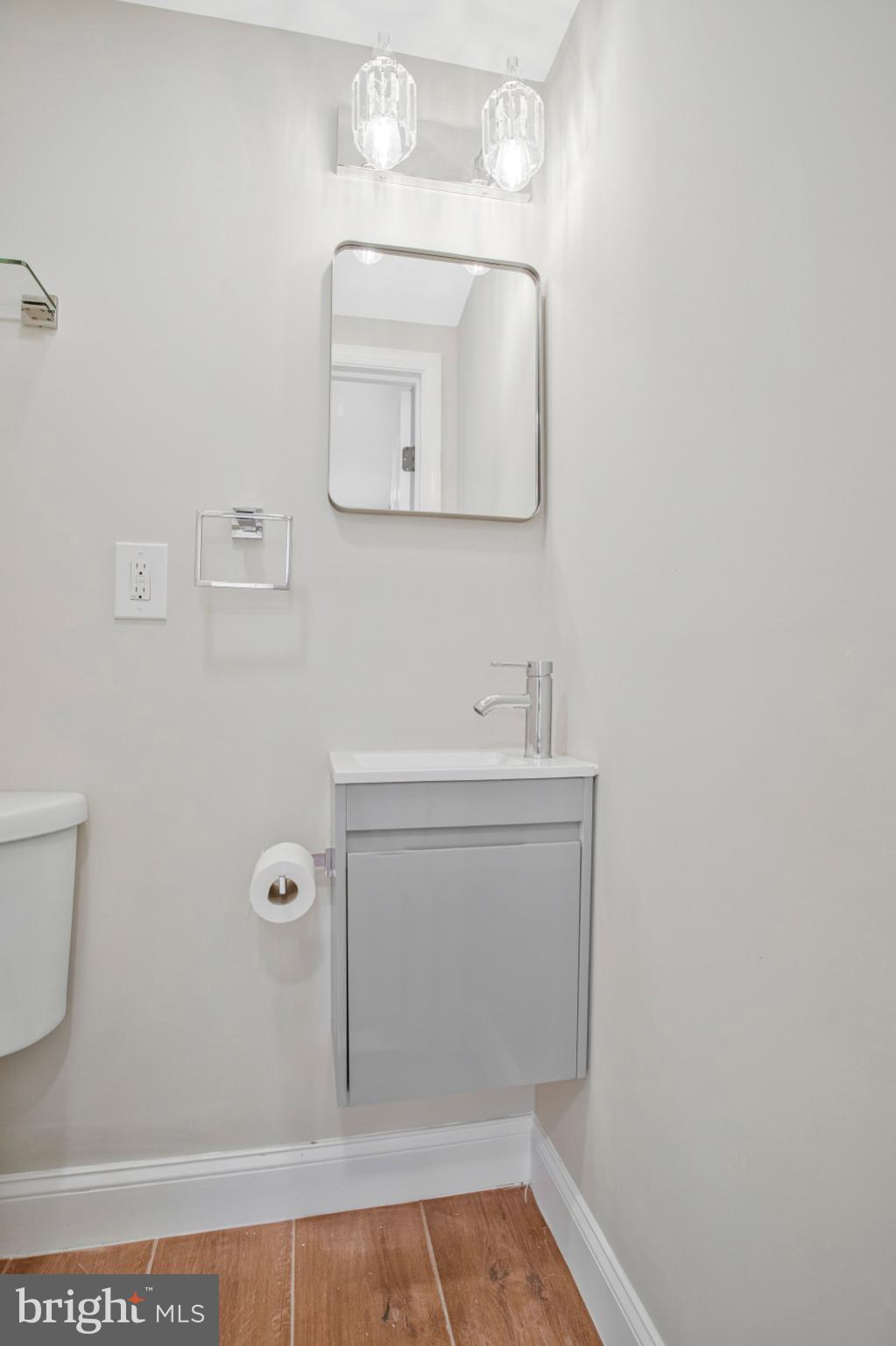 1102 Carroll Street Baltimore, MD 21230 - Photo 21 of 52 Sleek modern bathroom with elegant fixtures.