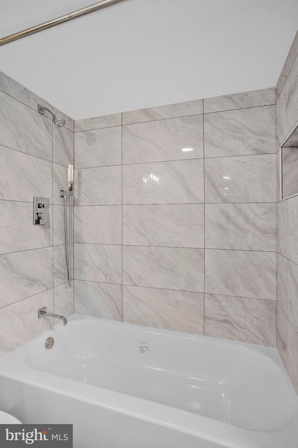 1102 Carroll Street Baltimore, MD 21230 - Photo 41 of 52 Sleek modern bathroom with elegant tiles.