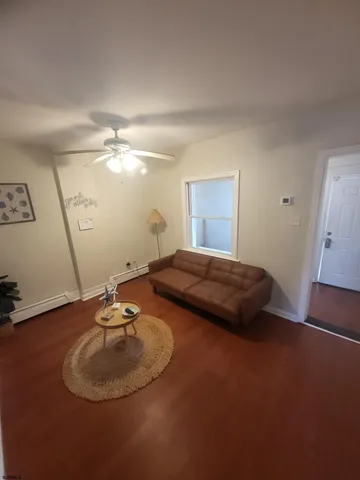a kitchen with a sink and a refrigerator