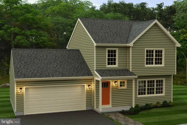 a view of house with backyard