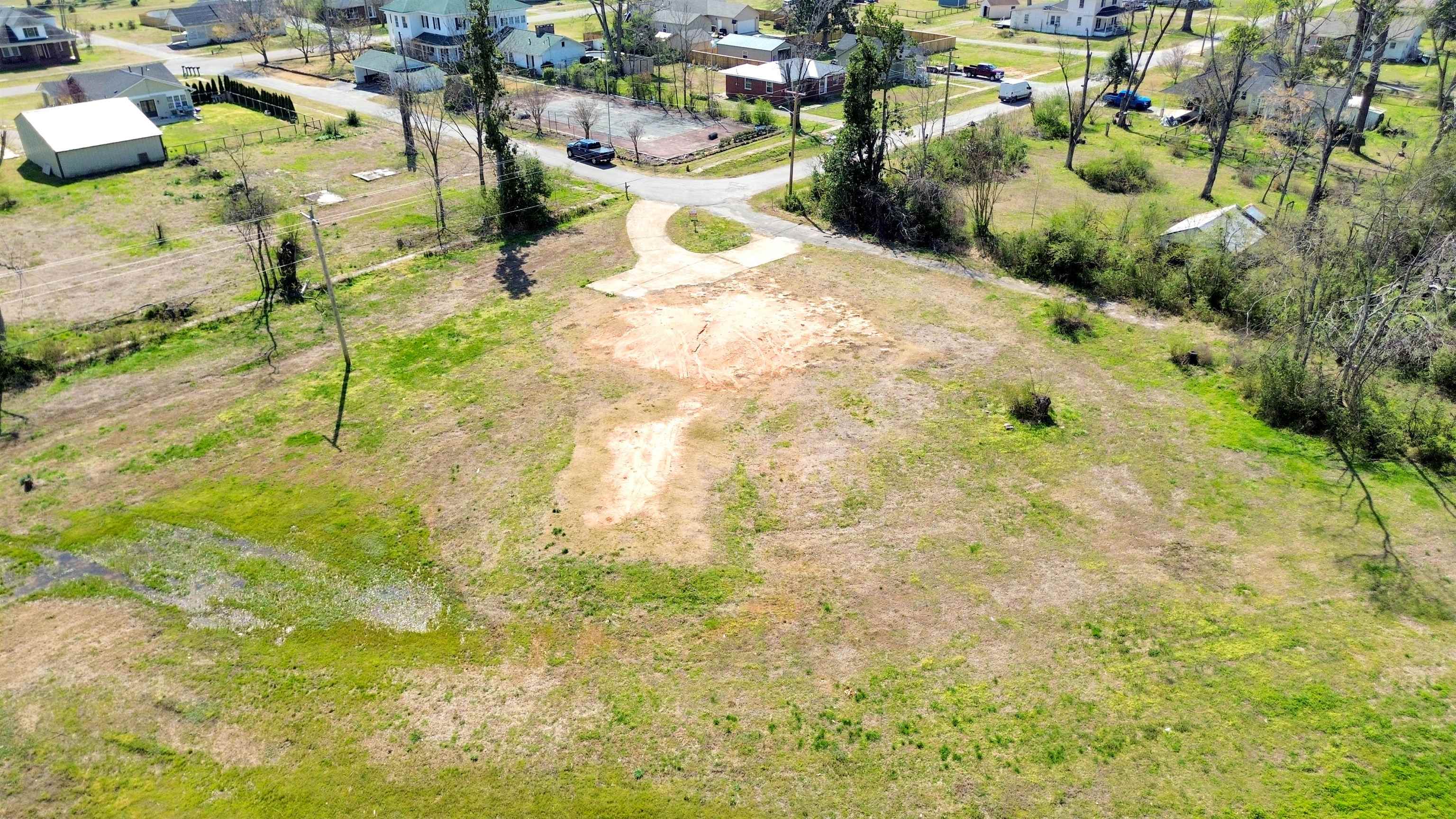 108 Jackson Street Grand Junction, TN 38039 - Photo 5 of 7 a view of a yard with swimming pool