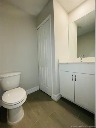 a bathroom with a toilet and a sink