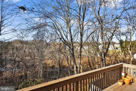 a view of balcony with trees