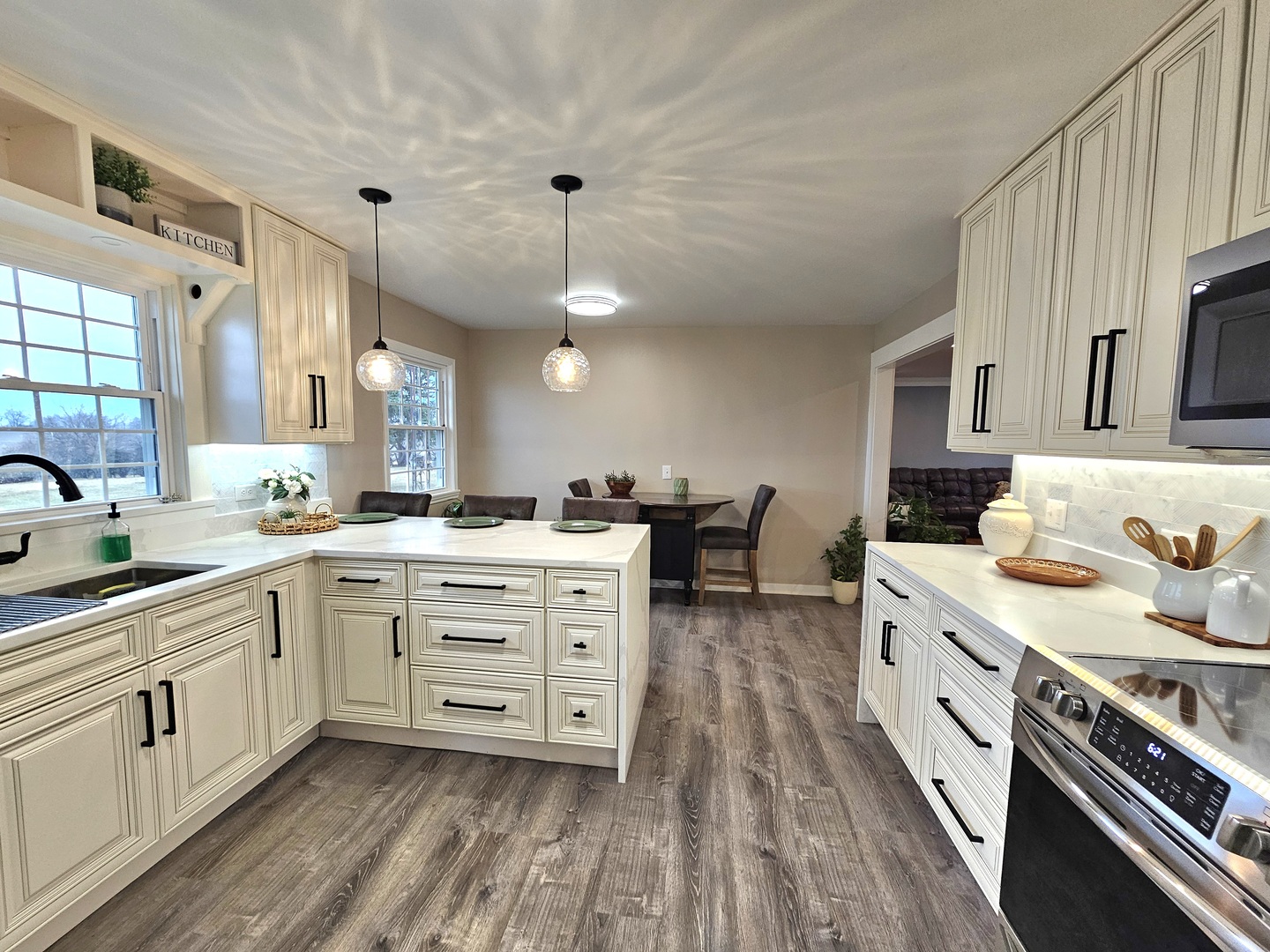 17954 East 10500N Road Grant Park, IL 60940 - Photo 12 of 37 a large kitchen with cabinets wooden floor and stainless steel appliances