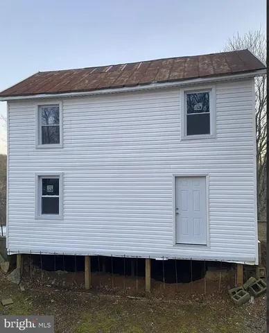 a view of a house with roof deck