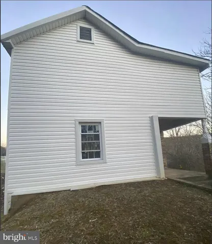 a front view of a house with garage