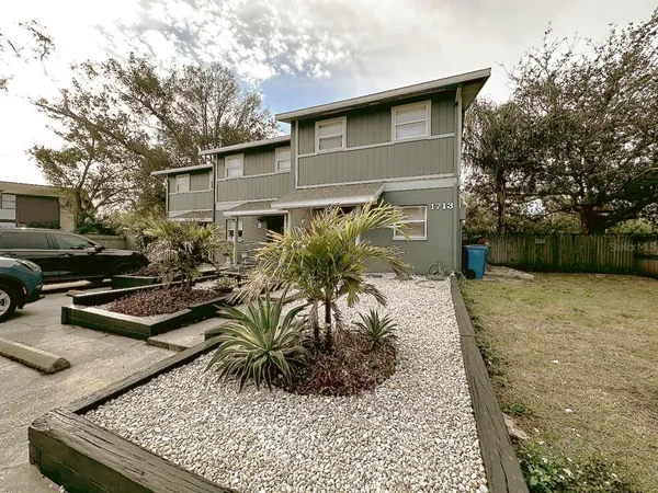 a view of backyard of house