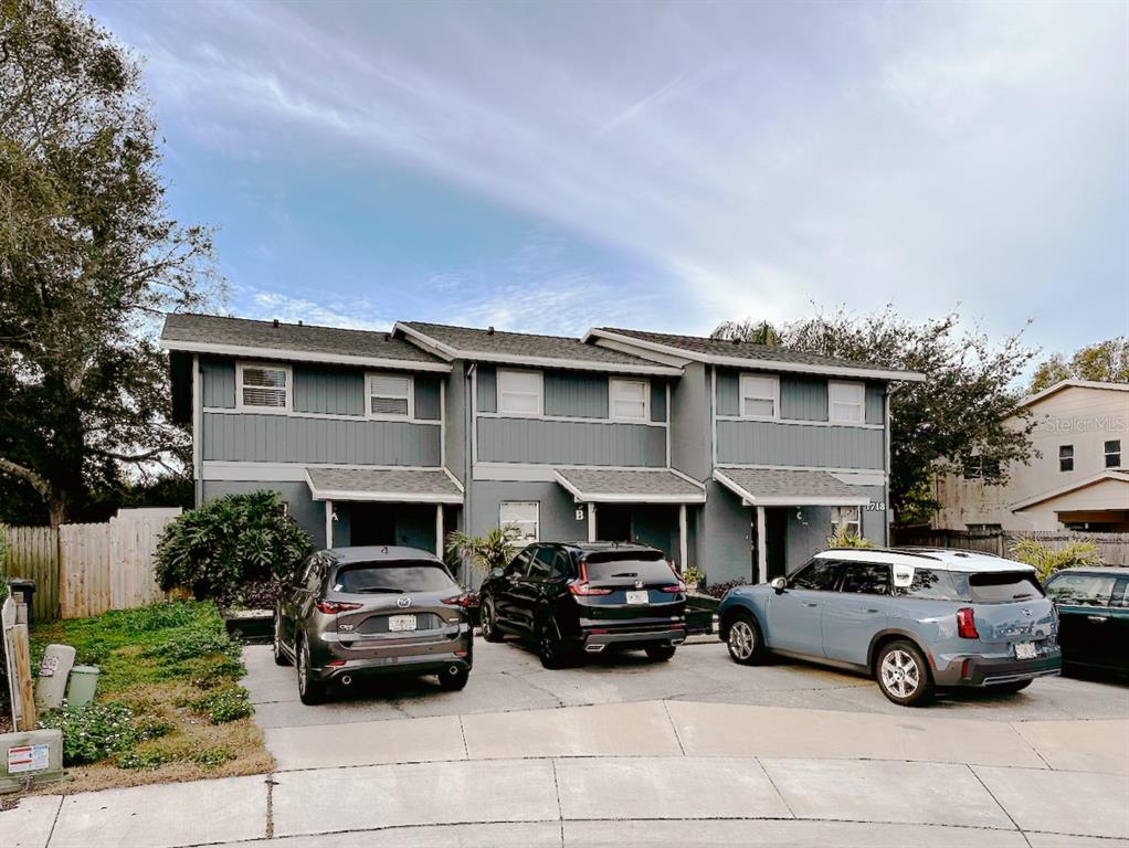 1713 Azalea Court, Unit A Oldsmar, FL 34677 - Photo 37 of 38 a car parked in front of a house