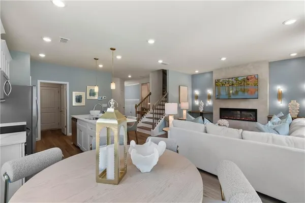 a kitchen with stainless steel appliances sink and microwave