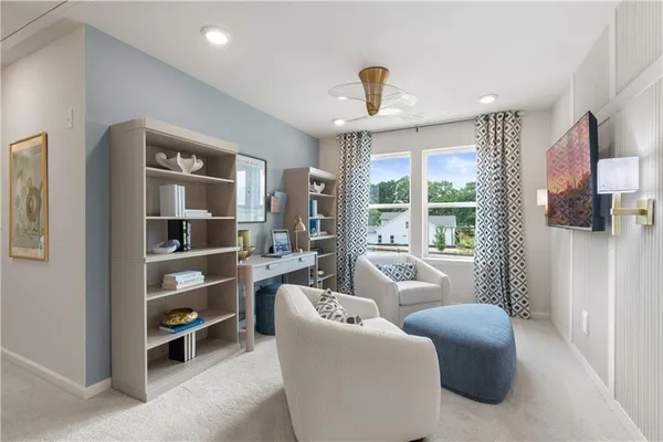 a living room with furniture and a window