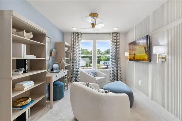 a living room with furniture and window