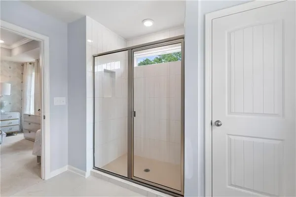 a bathroom with double sink and a mirror