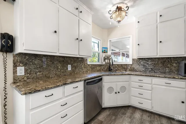 a sink a window and a rug