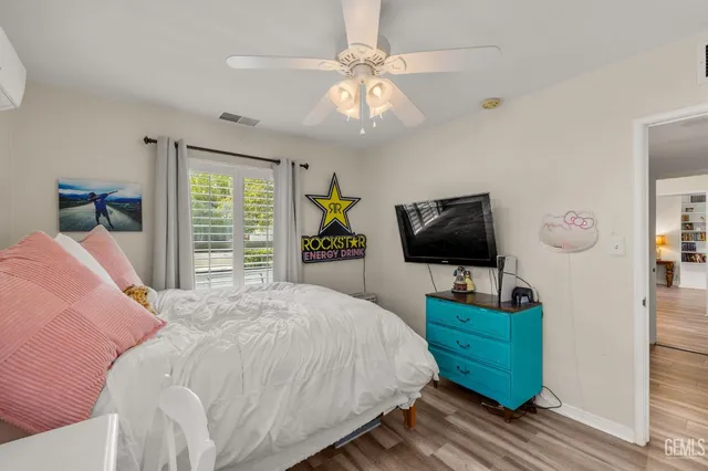 a utility room with cabinets and sink