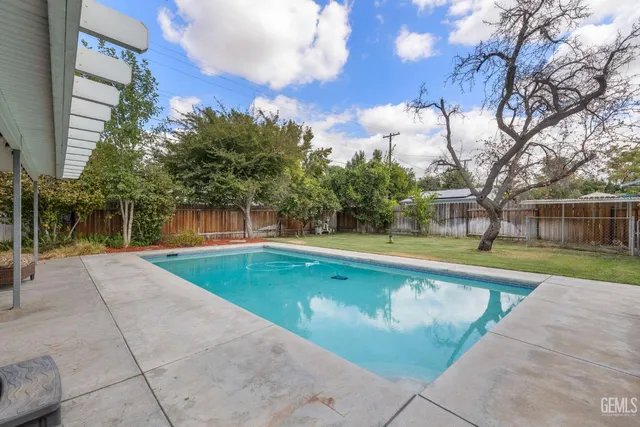 a view of a house with a swimming pool