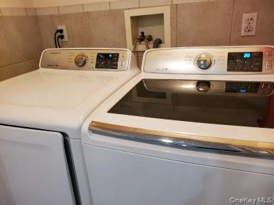 315 Washington Avenue, Unit 1 New Rochelle, NY 10801 - Photo 17 of 29 a close view of washer and dryer