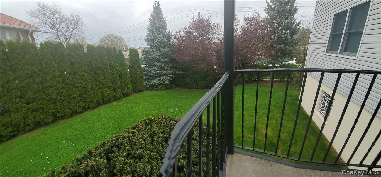 315 Washington Avenue, Unit 1 New Rochelle, NY 10801 - Photo 8 of 29 a view of balcony and garden