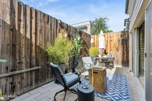 a view of balcony with patio