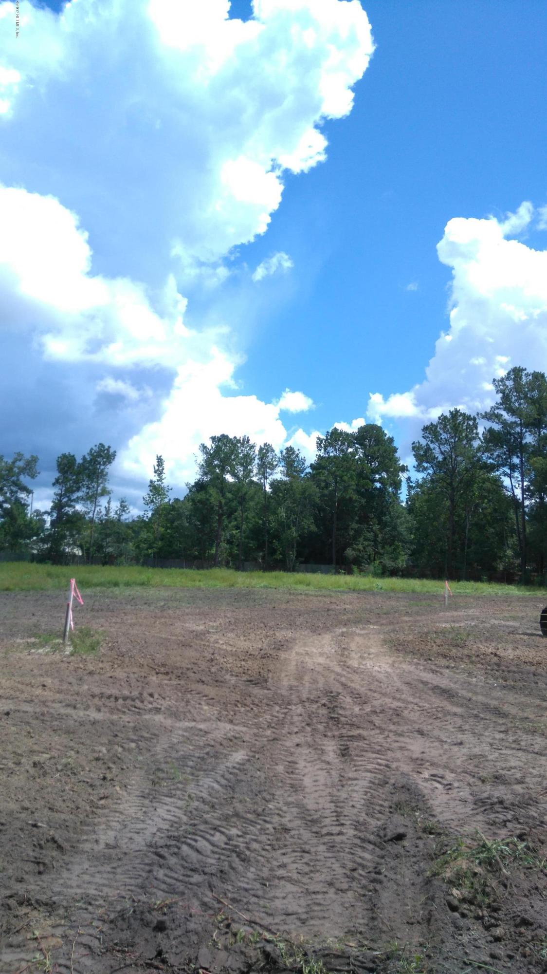 83 C Old Hard Road Fleming Island, FL 32003 - Photo 4 of 13 FUTURE DRIVEWAY OF LOT 3
