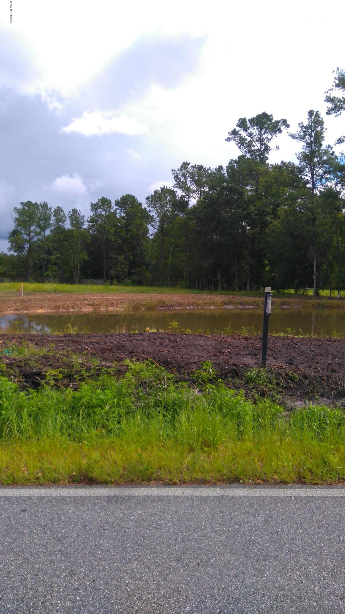 83 C Old Hard Road Fleming Island, FL 32003 - Photo 10 of 13 Pond Pic2 (2)