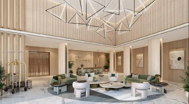 a dining room with furniture and a large window