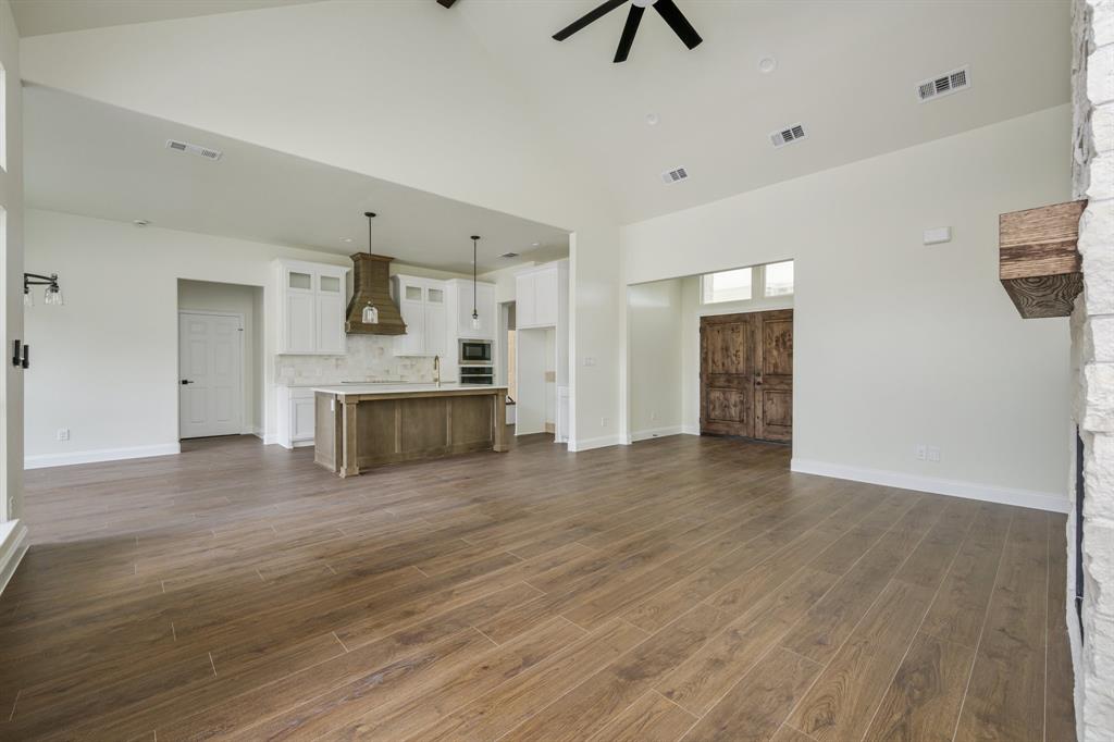 1844 County Road 2320 Terrell, TX 75160 - Photo 6 of 27 a view of a kitchen with a sink and a refrigerator
