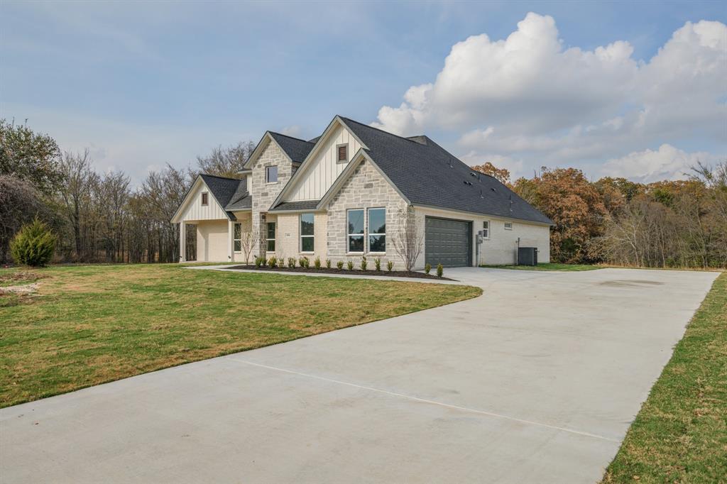 1844 County Road 2320 Terrell, TX 75160 - Photo 5 of 27 a view of house with garden space and trees around