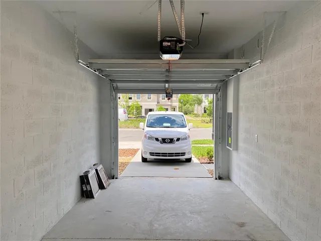 a hallway with a chandelier